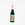 OCTAEVO's Natural Wine Ornament: bottle-shaped with a pink top, wavy label, and gold hanging string.