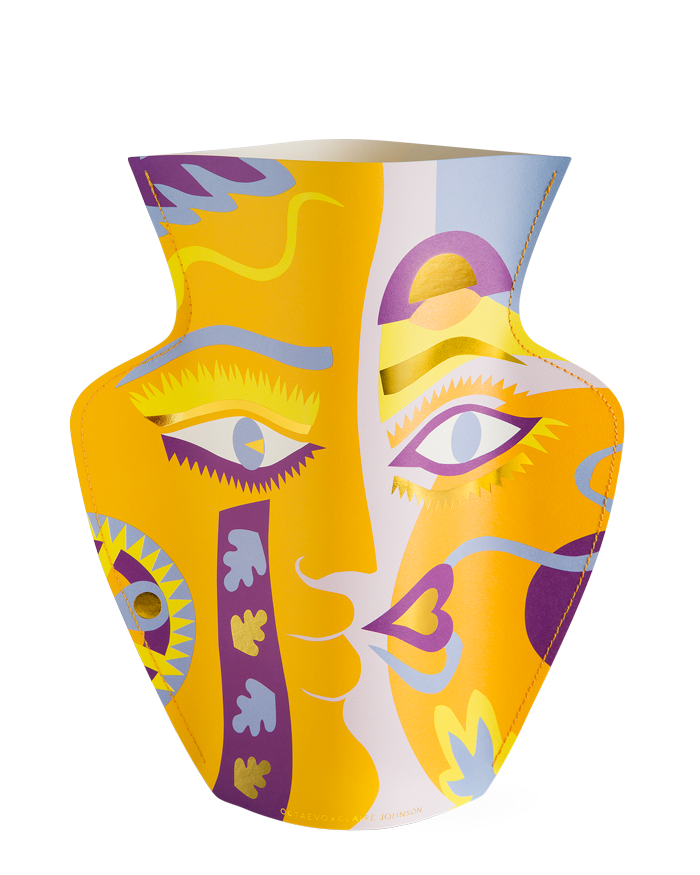 The "Claire Johnson Paper Vase" by OCTAEVO features bold geometric shapes and stylized face designs.
