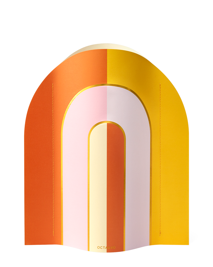 The OCTAEVO Paper Vase Riviera Arch features retro ‘60s arch designs in orange, pink, yellow, and cream on white.