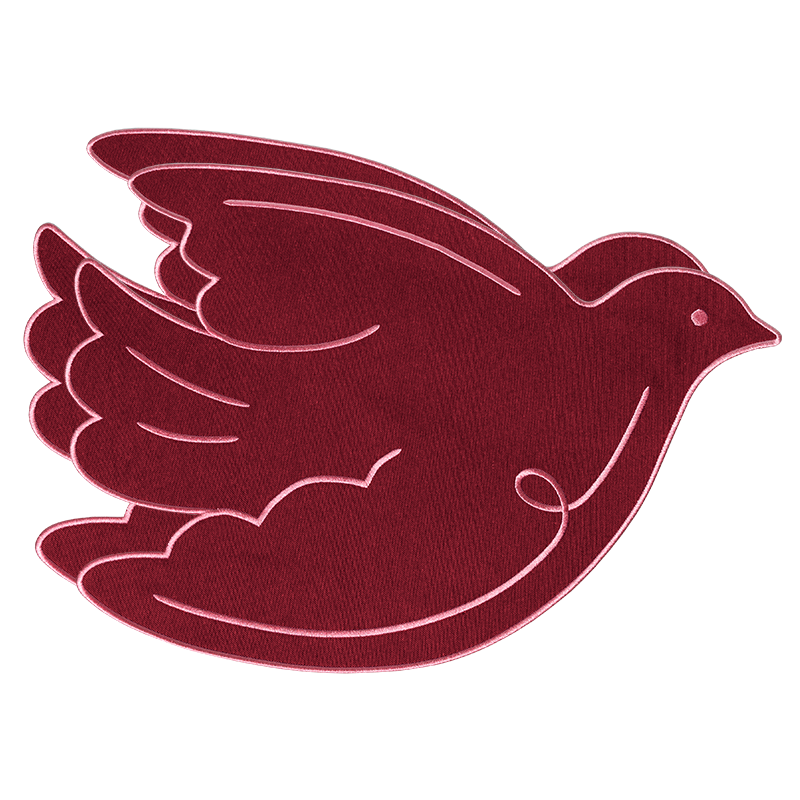 A red embroidered patch in the shape of a flying dove, outlined in a contrasting light thread, shown on a plain background.