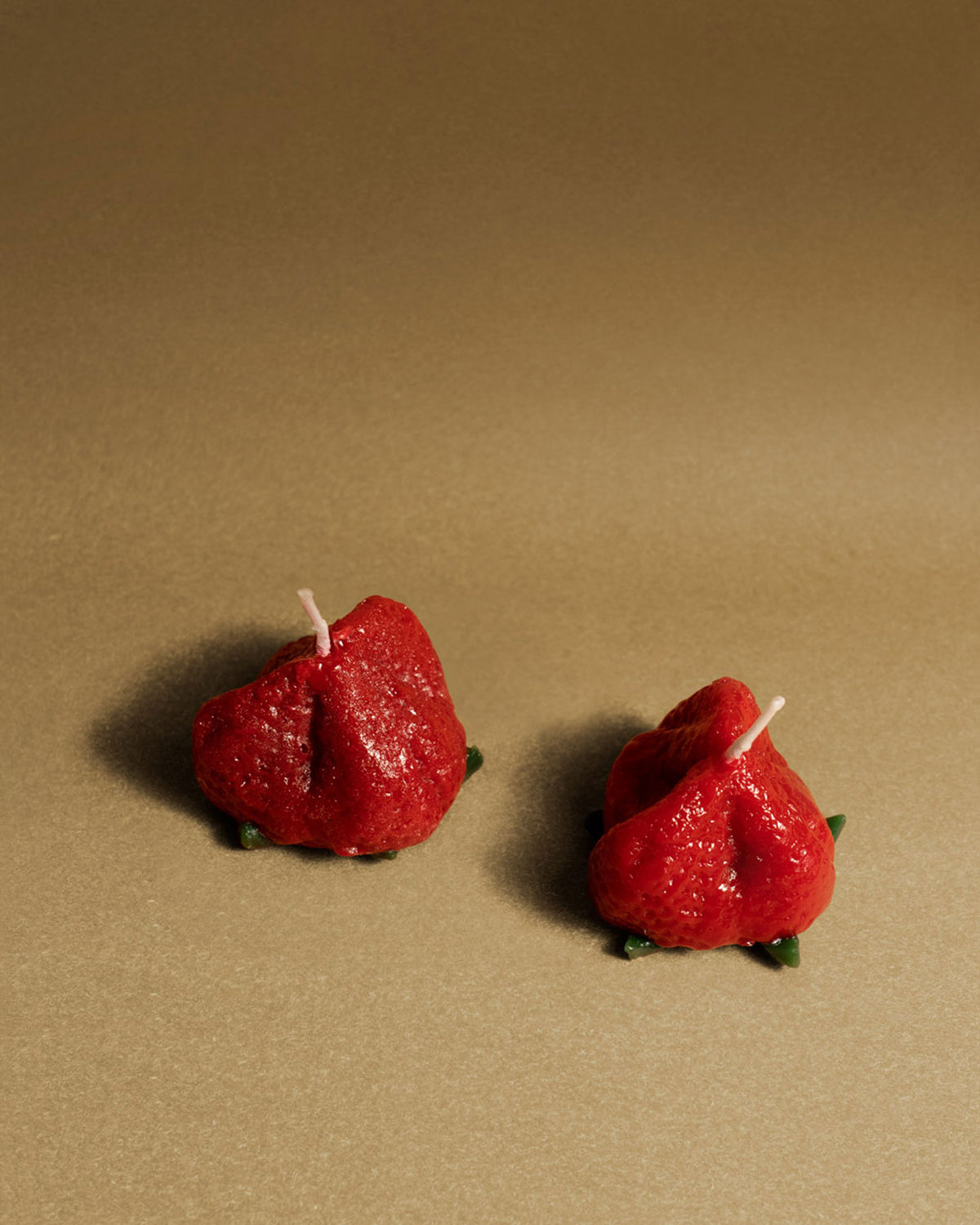 OCTAEVO Strawberry Candles, Set of 2, feature hand-poured red strawberry shapes