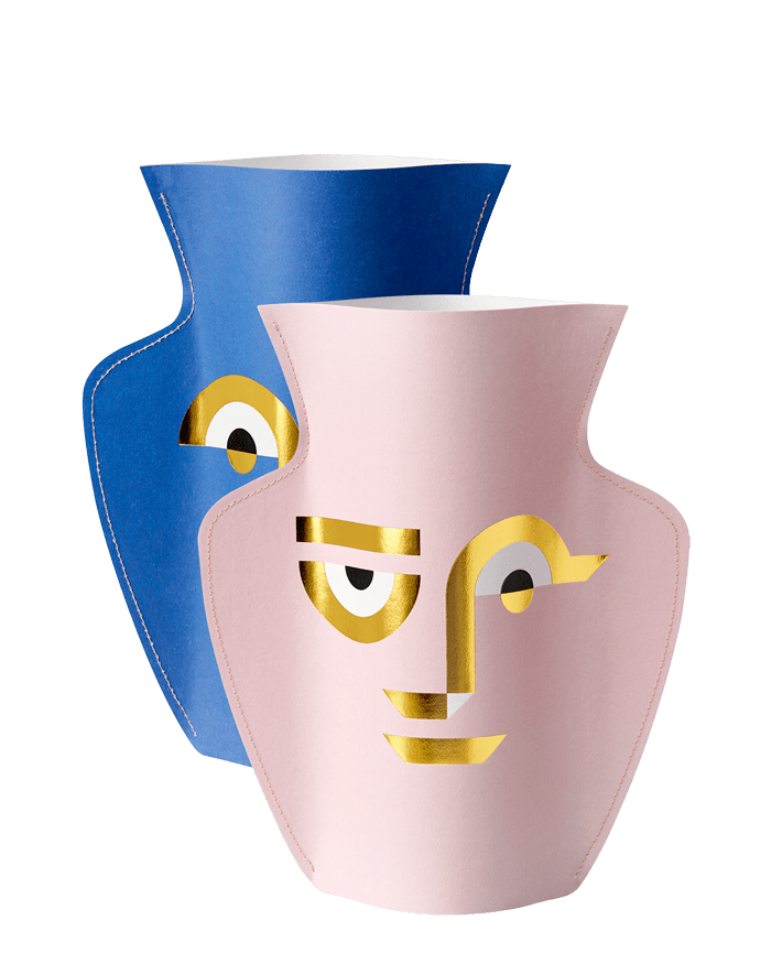 The Apollo Paper Vase by OCTAEVO comes in pink and blue with gold and white face designs for Mediterranean decor.