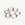 Six silver strips create a swirling pattern on Christofle's Arabesque Silver Trivet, inspired by French design.