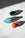 A trio of coloful OCTAEVO Atlas Glass Bird trio brighten any sunlit marble display.