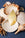The Octaevo Bookmark Pearl Shell sits on white seashells against a dark blue background.