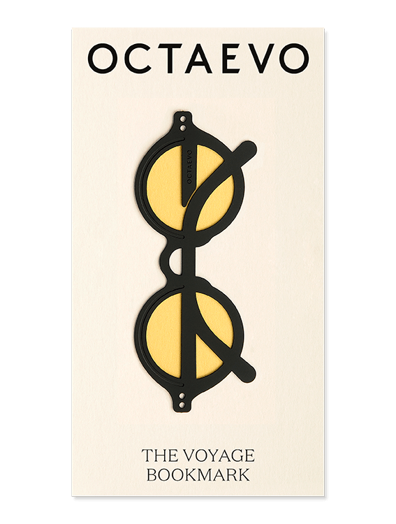 A black brass sunglasses bookmark with yellow lenses by OCTAEVO, inspired by Mediterranean Rivieras. 