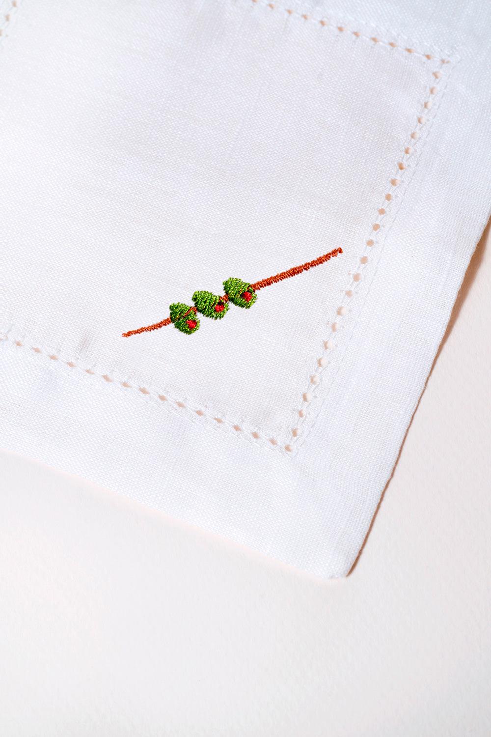 Octaevo Cocktail Napkin Olive, Set of 2—eco-friendly linen with an embroidered olive branch and three leaves.