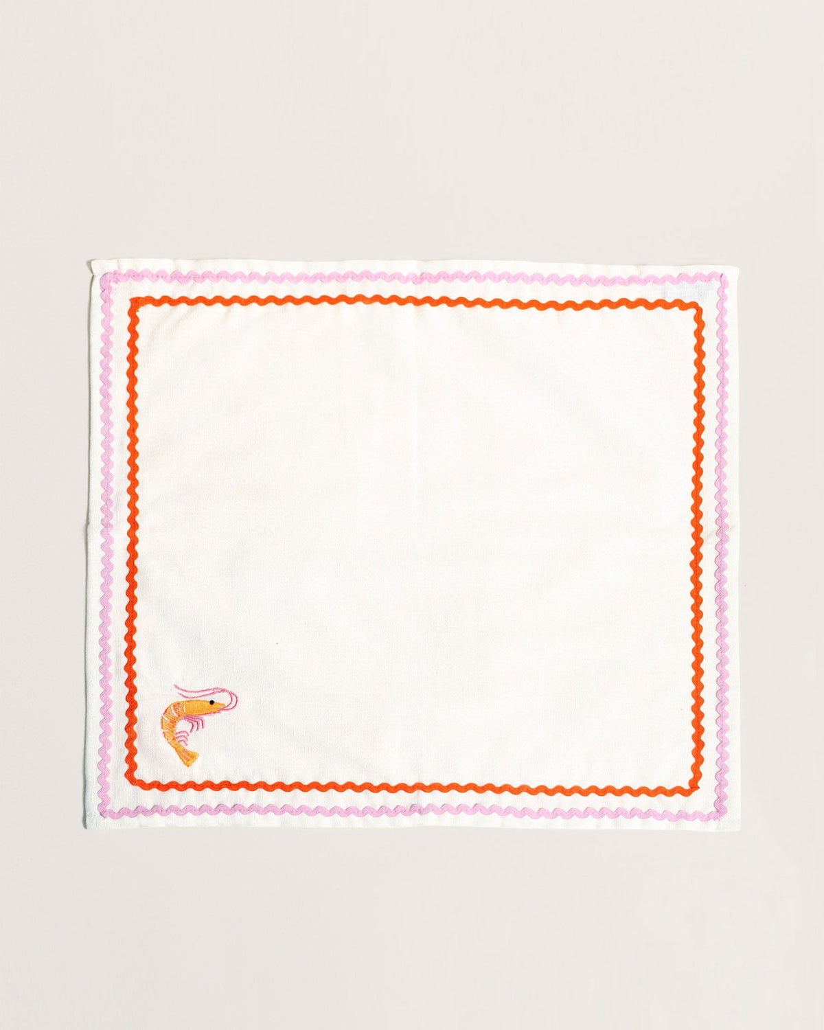 The Octaevo Dinner Napkin Prawn, Set of 2, features white napkins with prawn embroidery and vibrant borders.