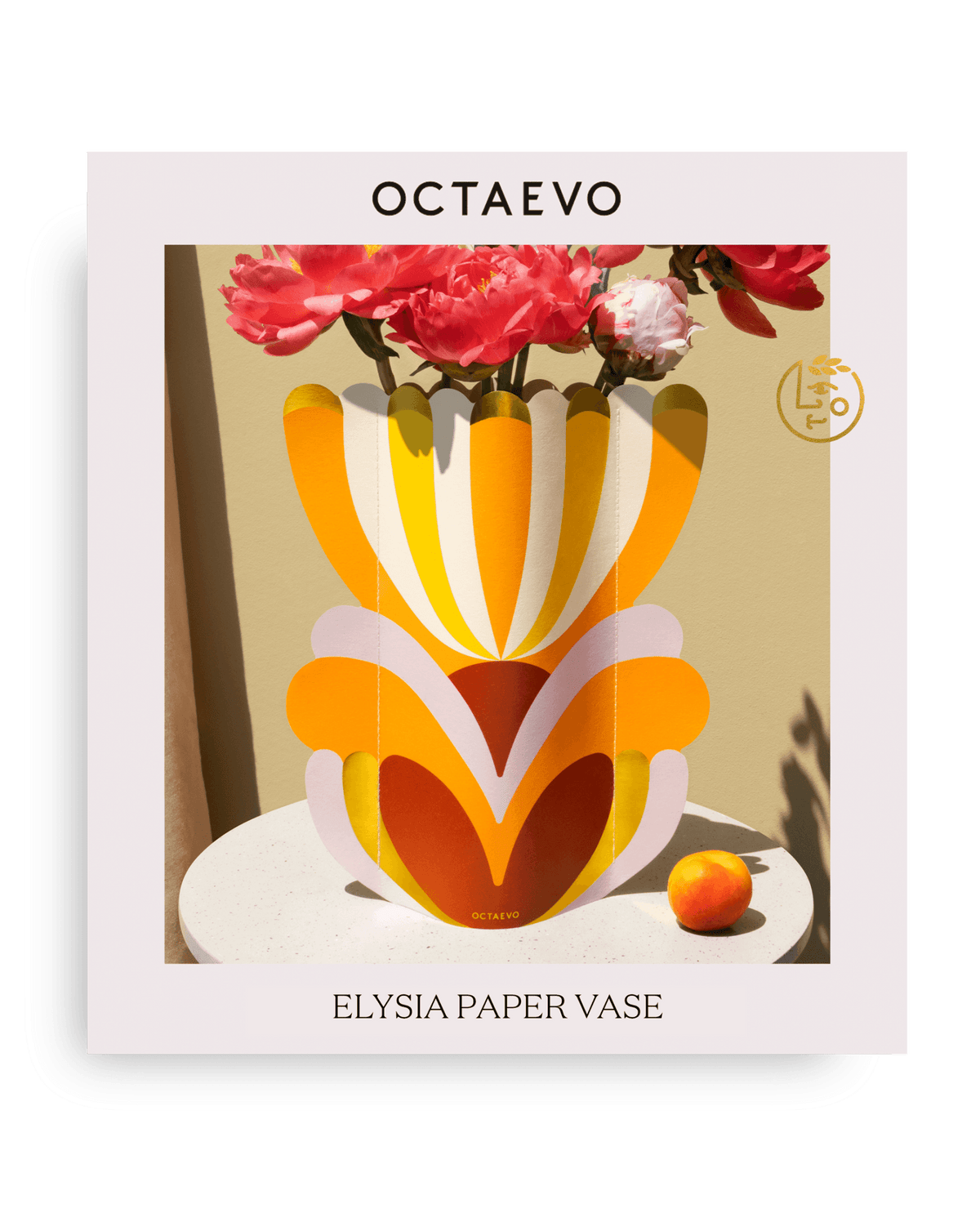 The OCTAEVO Elysia Paper Vase holds pink flowers; water resistant, beside an orange.