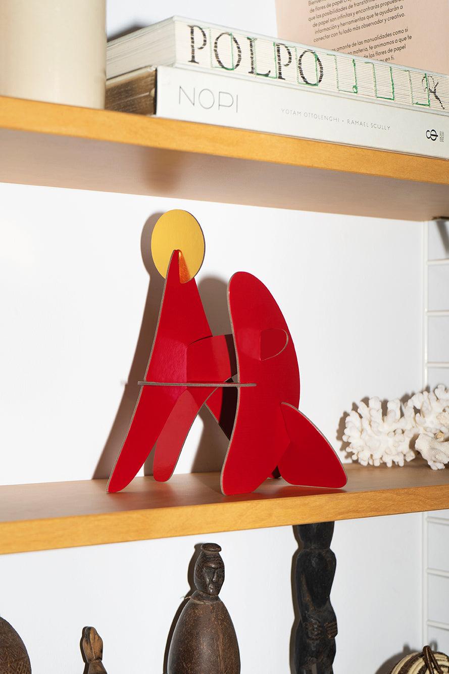 Fire Paper Sculpture by Octaevo adds artistic flair to your shelf among books and decor with its red and yellow recycled cardboard.
