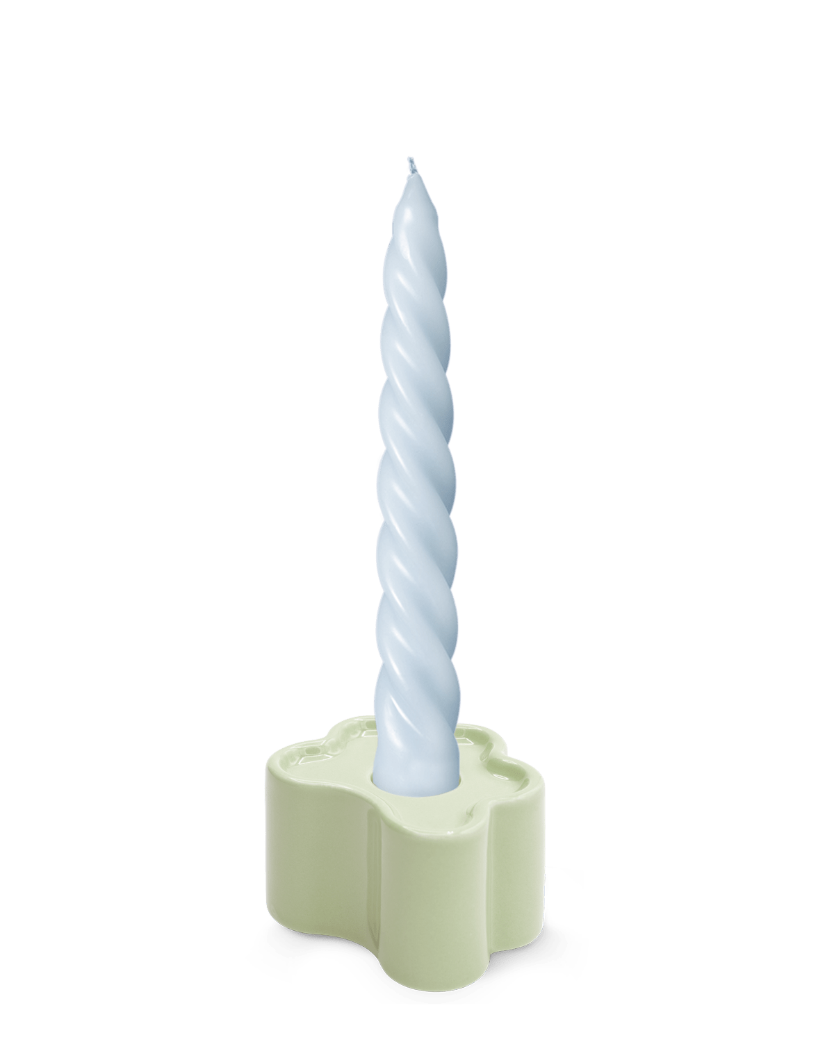 A light blue candle in OCTAEVO's Flora Candle Holder in Mint, a hand-glazed ceramic flower shape, on white background.