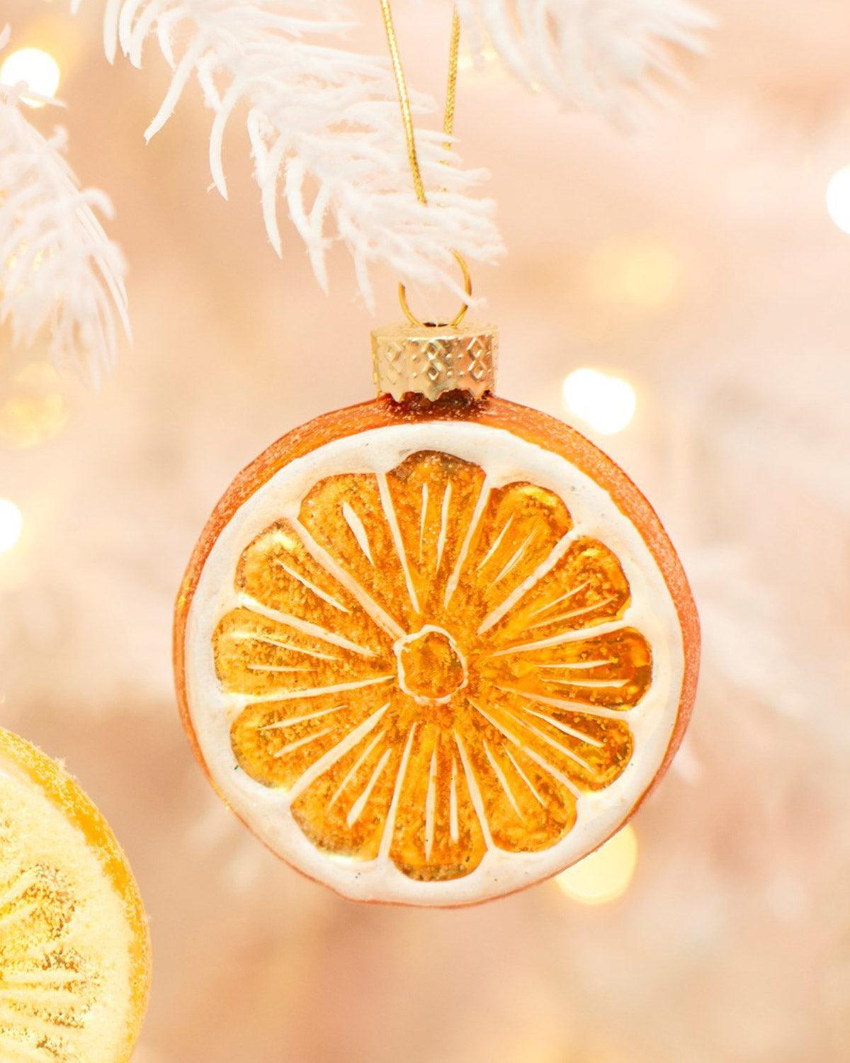 Octaevo’s Fruity Frolics Baubles (Pack of 3) add a citrusy cocktail vibe to any white Christmas tree with warm lights.