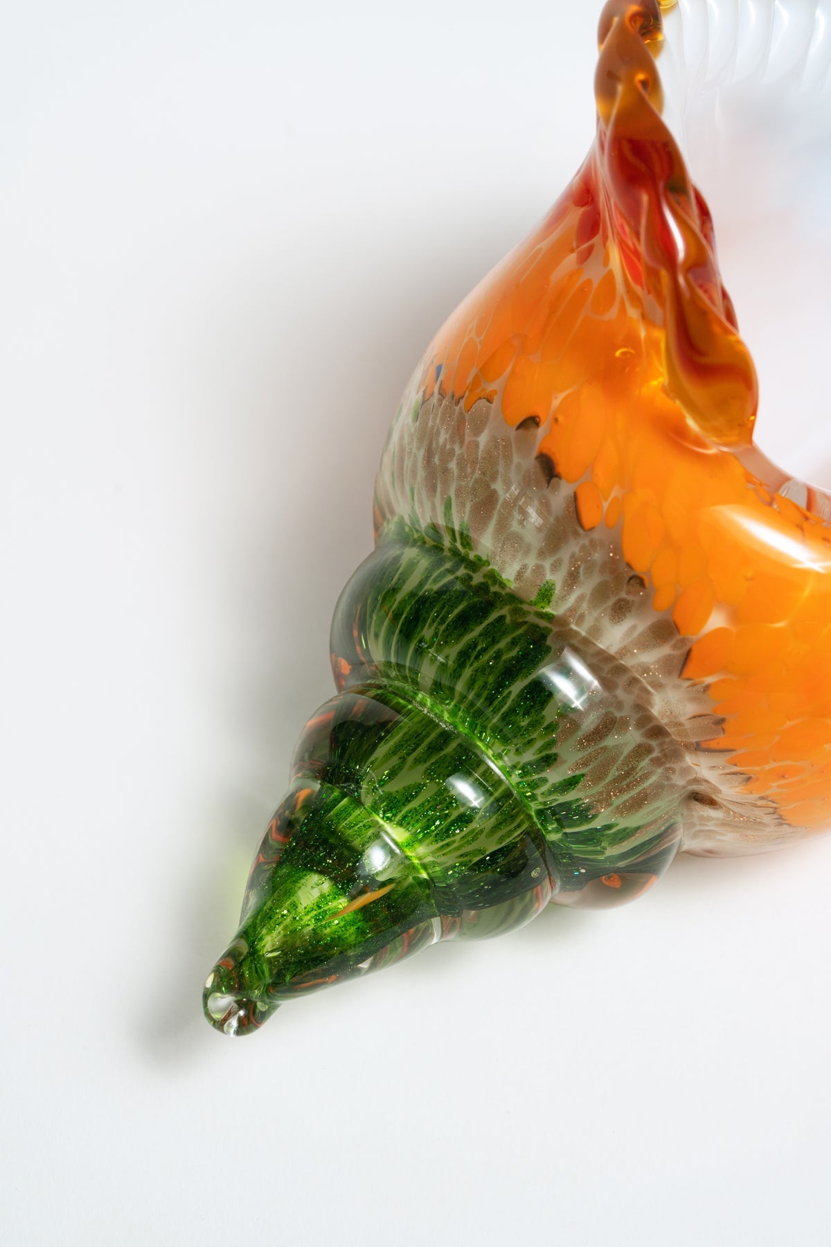 Octaevo Glass Conch Shell Sculpture—vibrant hand-blown glass, ideal as a decorative paperweight.