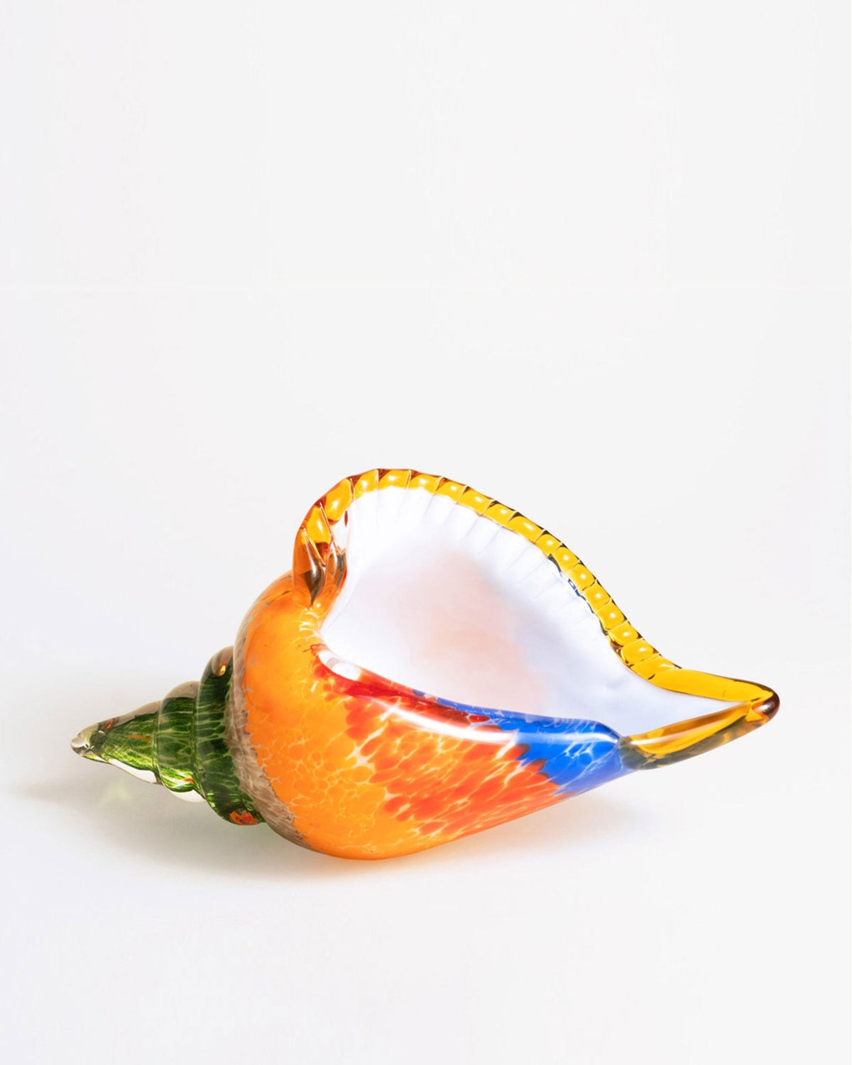 Octaevo Glass Conch Shell Sculpture with orange, green, blue, and white accents on a plain white background.