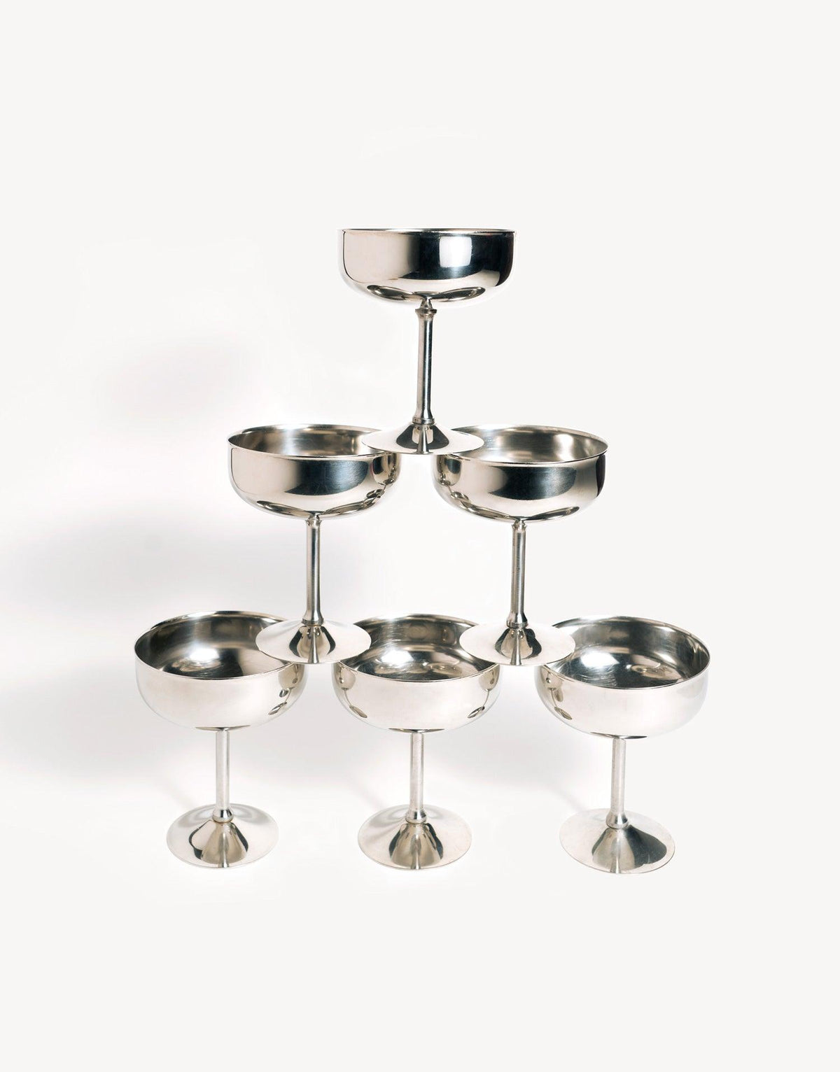Two stylish Ice Cream Bowls by OCTAEVO, perfect for serving desserts or vintage cups on a clean white surface.