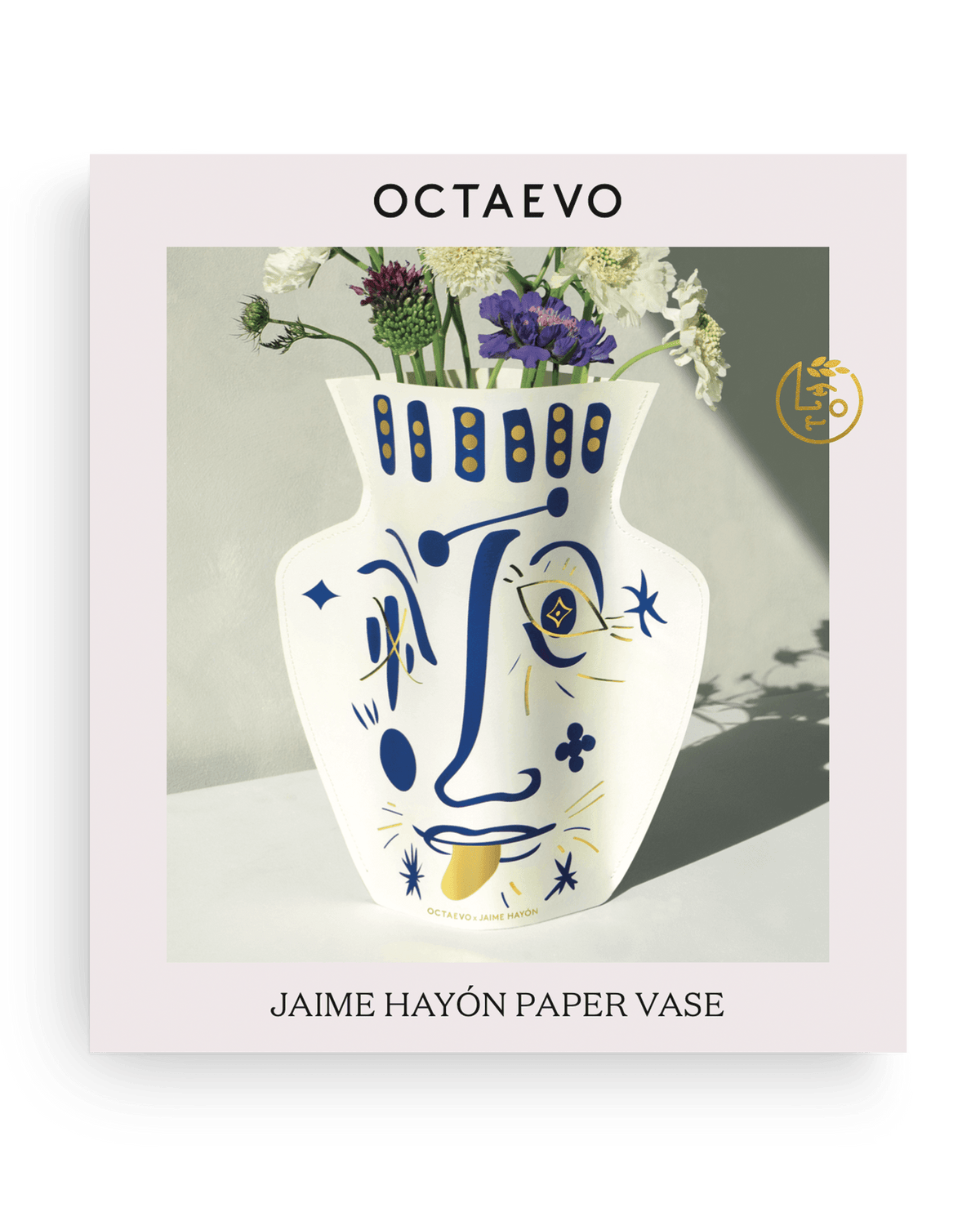 OCTAEVO Jaime Hayon Paper Vase—Vasage White: Blue & gold abstract face design, inspired by Jaime Hayon.