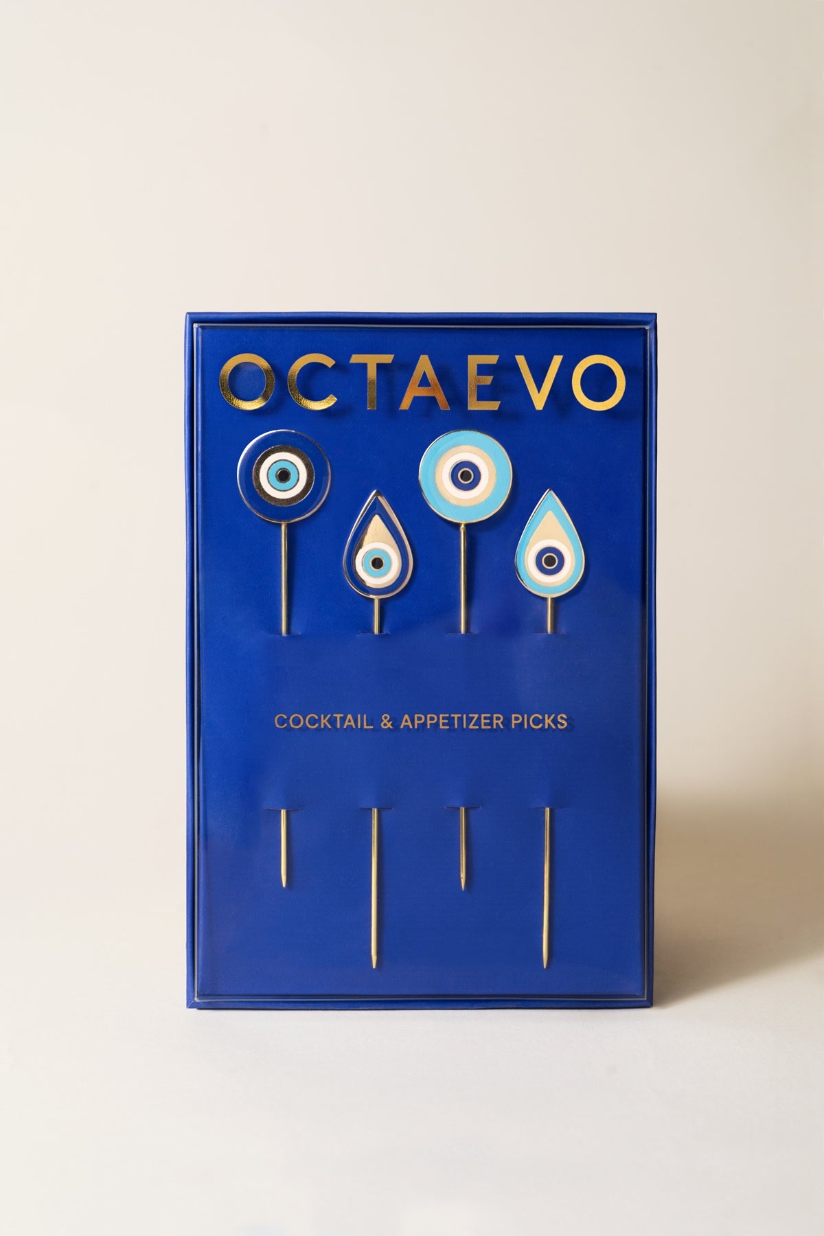 OCTAEVO Lucky Charm Cocktail Picks (Set of 4): gold-plated evil eye picks for stylish, reusable cocktail serving.