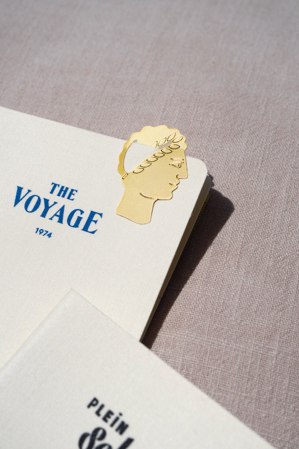 OCTAEVO's Philosopher Metal Clips honor THE VOYAGE 1974—a collectible for curious minds and lifelong learners.