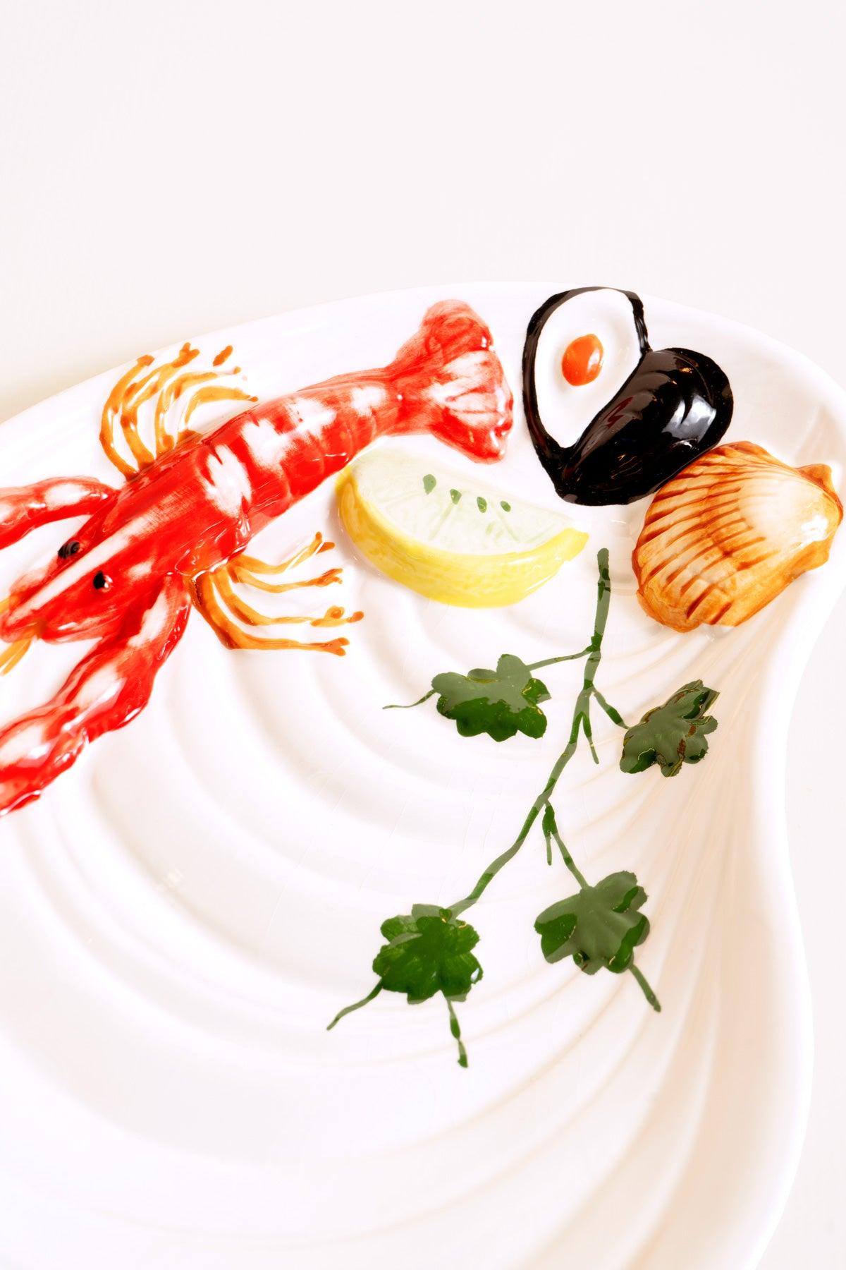 OCTAEVO Mussel Plate — Large: Hand-painted porcelain with lobster, lemon, mussel & shells on crisp white.