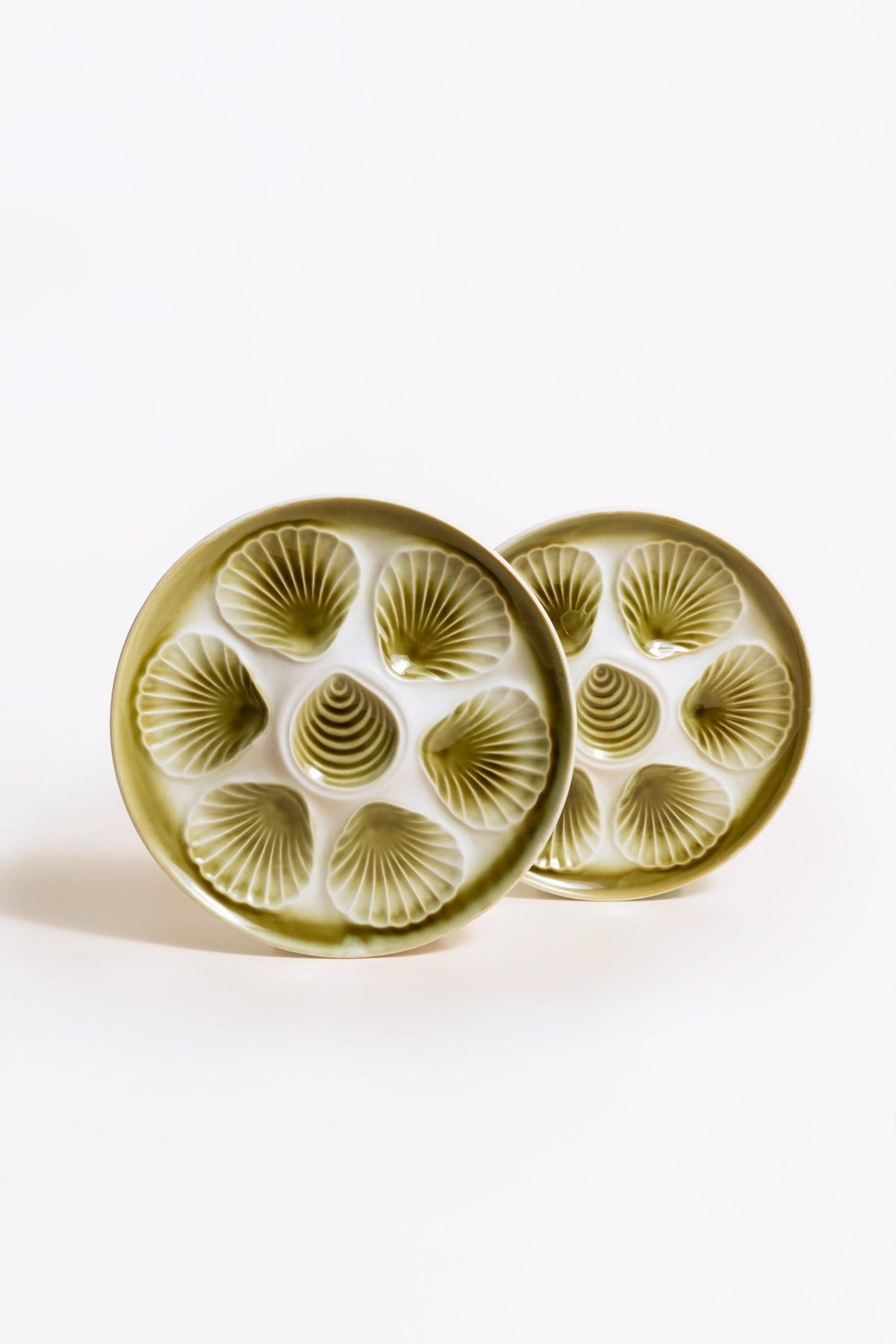 OCTAEVO Oyster Plates (Set of 2): vintage white ceramic with hand-painted green shell-shaped indentations.