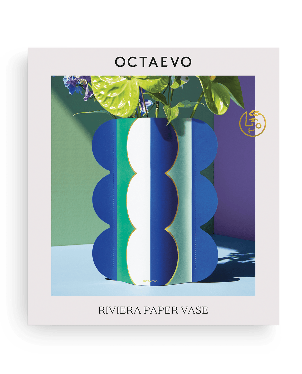 OCTAEVO Riviera Wave Paper Vase in blue, green, and white with flowers—ideal for Mediterranean decor.