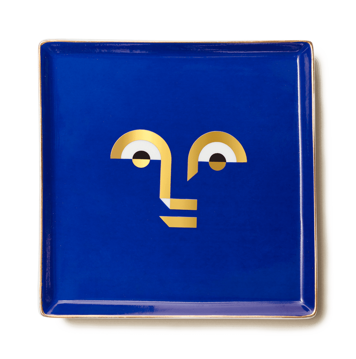 The Apollo Ceramic Tray by OCTAEVO is a square blue ceramic tray with a minimalist gold and white abstract face.