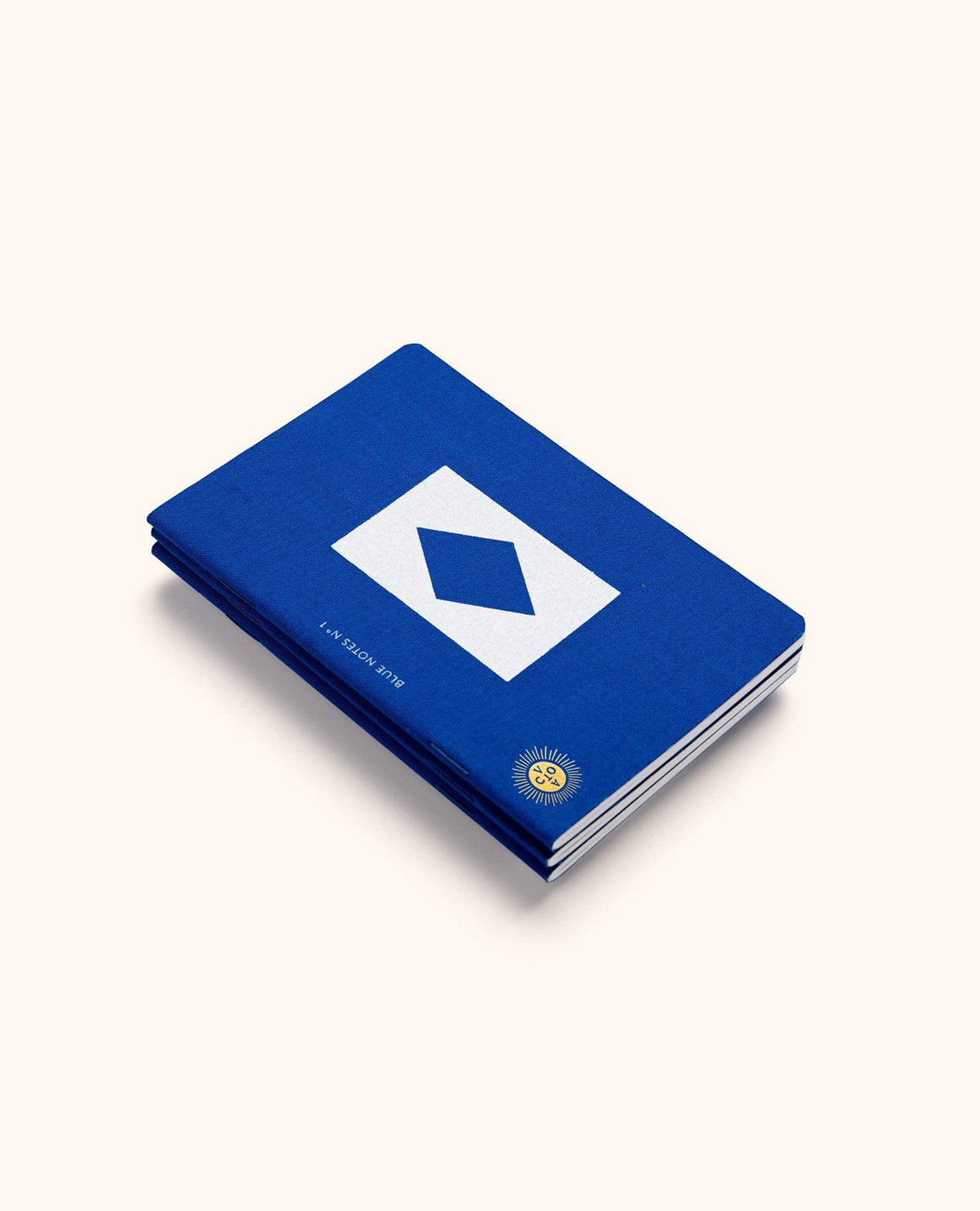 OCTAEVO Blue Passport Notes Box of 3: blue hardcovers with white diamond, shown closed on light background.