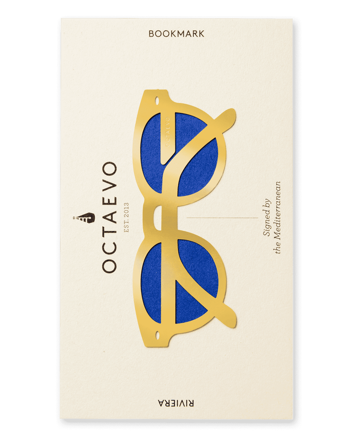 The Bookmark Riviera by OCTAEVO is a gold and blue sunglasses bookmark, inspired by Mediterranean Rivieras.