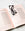 The black OCTAEVO Bookmark Riviera rests on an open magazine, adding style to a marble surface.