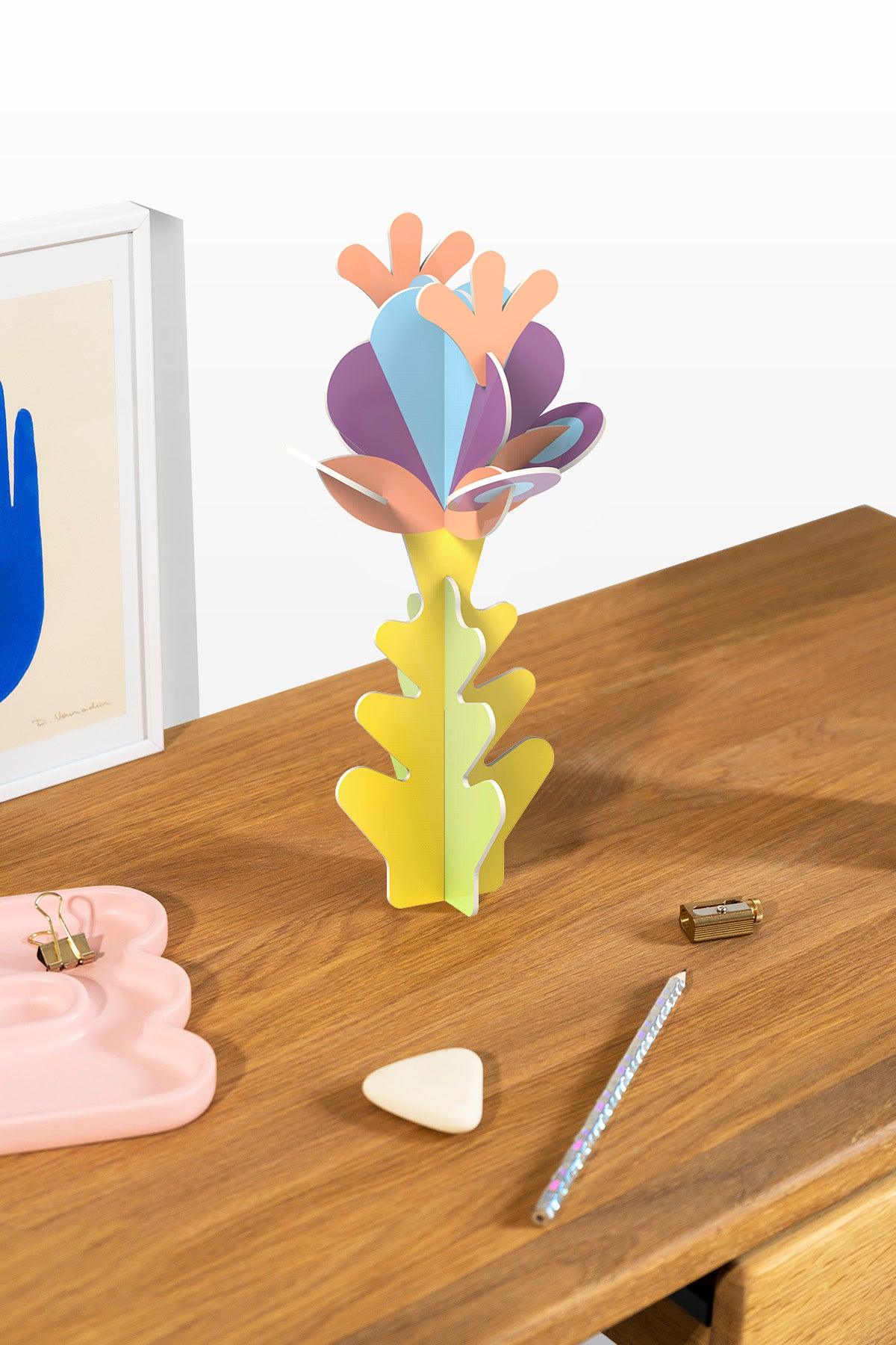 The Octaevo Flower Paper Sculpture 4 adds a vibrant touch to your desk, creating a home oasis vibe.