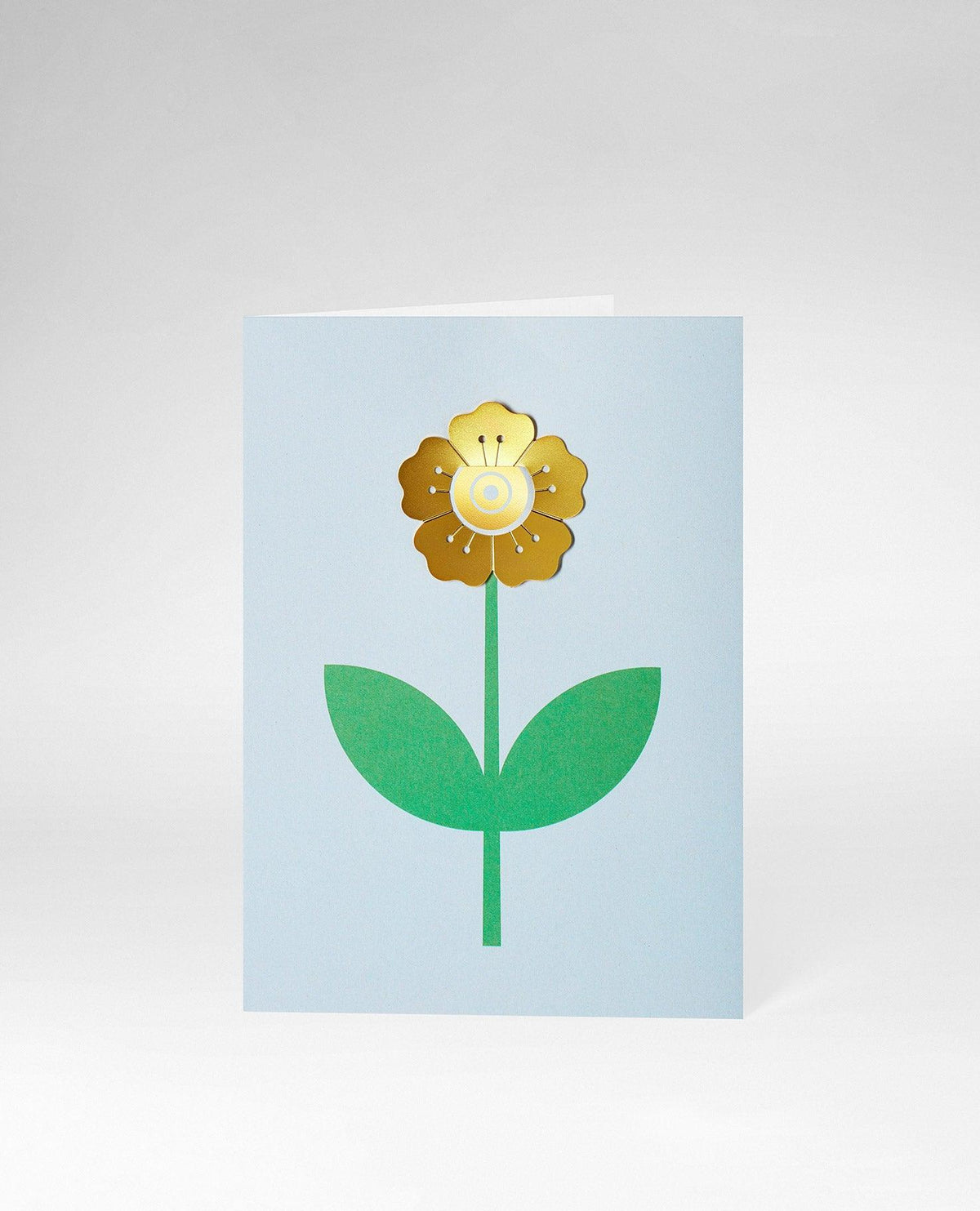 OCTAEVO Greeting Card Flower features a yellow bloom with green leaves on blue—ideal for stationery card lovers.
