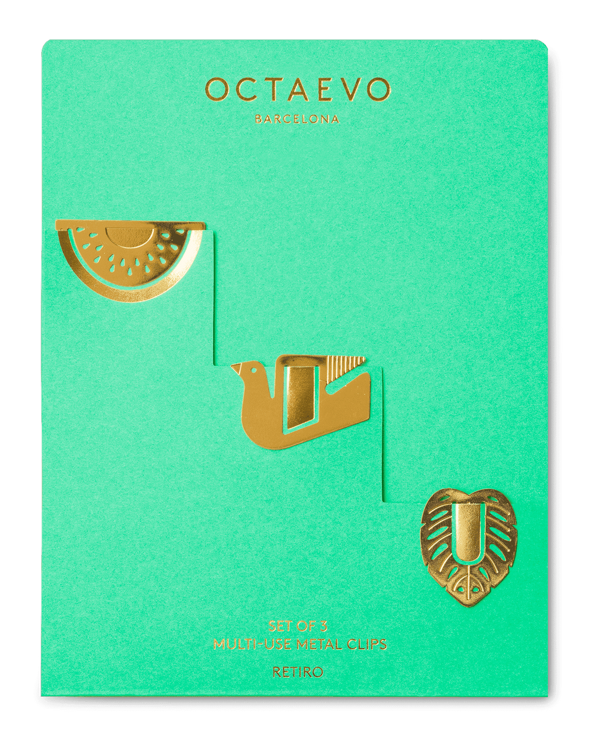 Three gold brass metal Clips by OCTAEVO, shaped like a melon, bird and leaf on a green branded card.
