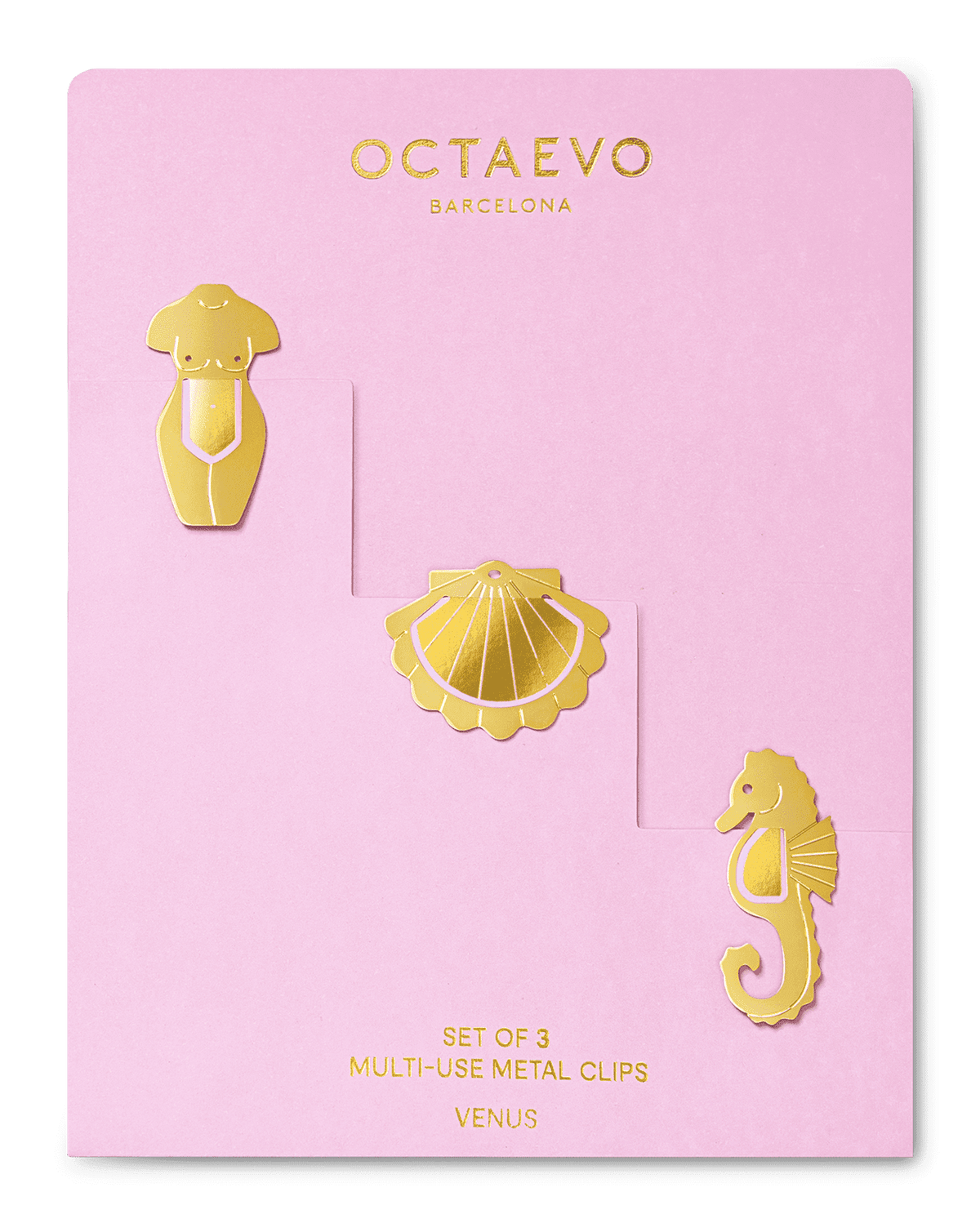 Metal Clips Venus by OCTAEVO: gold clips shaped like a torso, seashell & seahorse on a pink branded card.