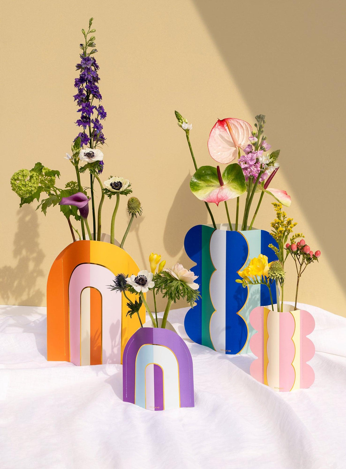 OCTAEVO’s Riviera Arch Mini Paper Vase adds a bold, colorful accent to any unique home decor.