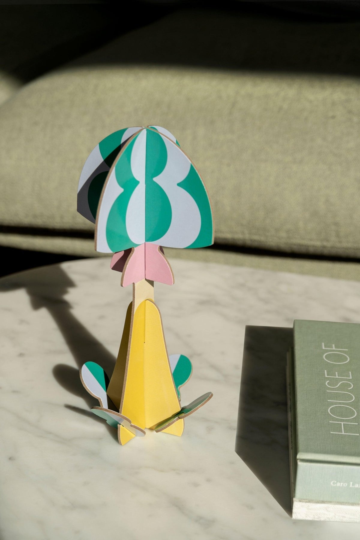 Octaevos Mushroom Paper Sculpture 4 adds a colorful, unique touch to your dining table decor in natural light.