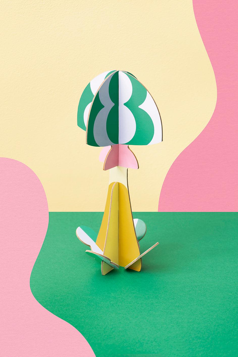 OCTAEVO Meadow Mushroom Paper Sculpture: a vibrant 3D art piece crafted from recycled cardboard.