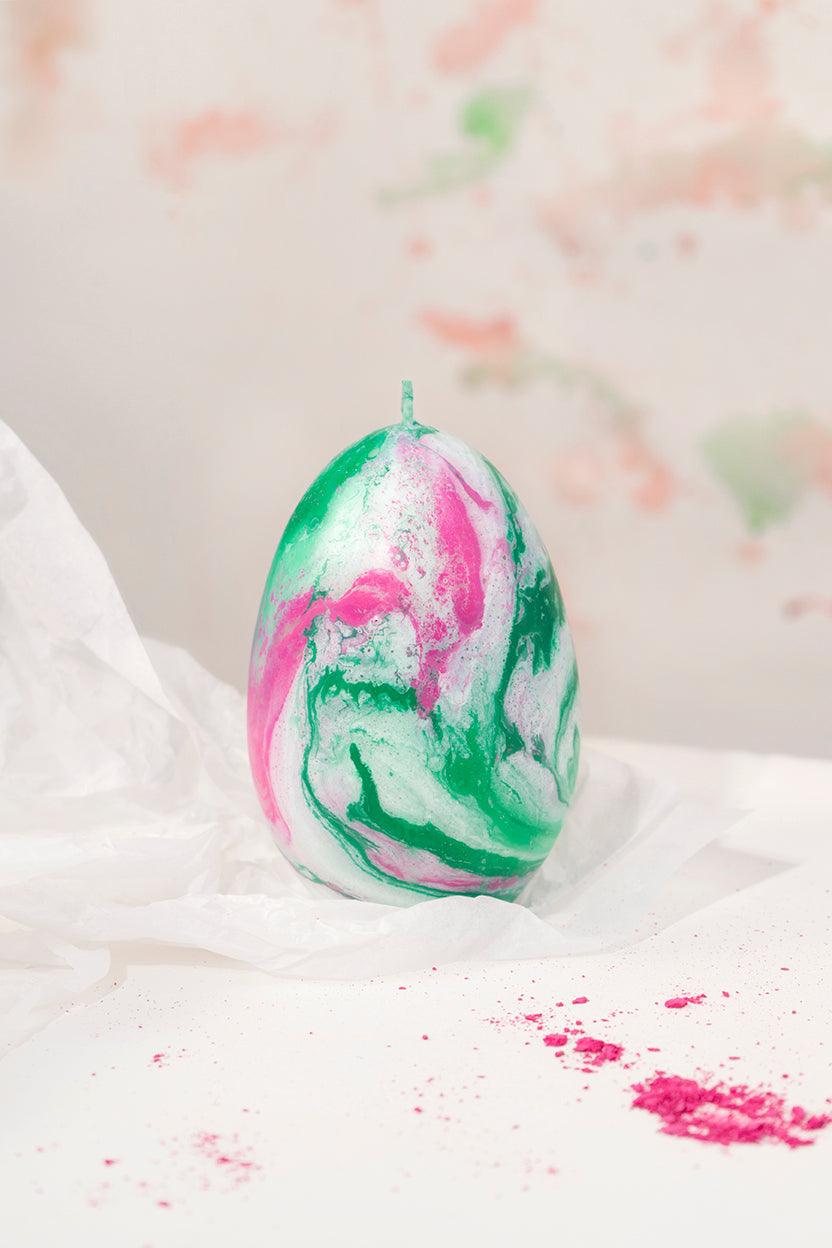 The Olimpo Marble Candle by Octaevo features green, white & pink swirls and is handmade in Italy.
