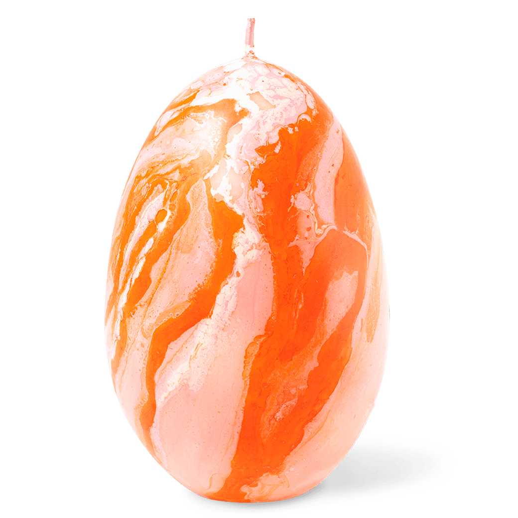 The Olimpo Marble Candle by Octaevo is an orange and white egg-shaped candle, handmade in Italy with a visible wick.