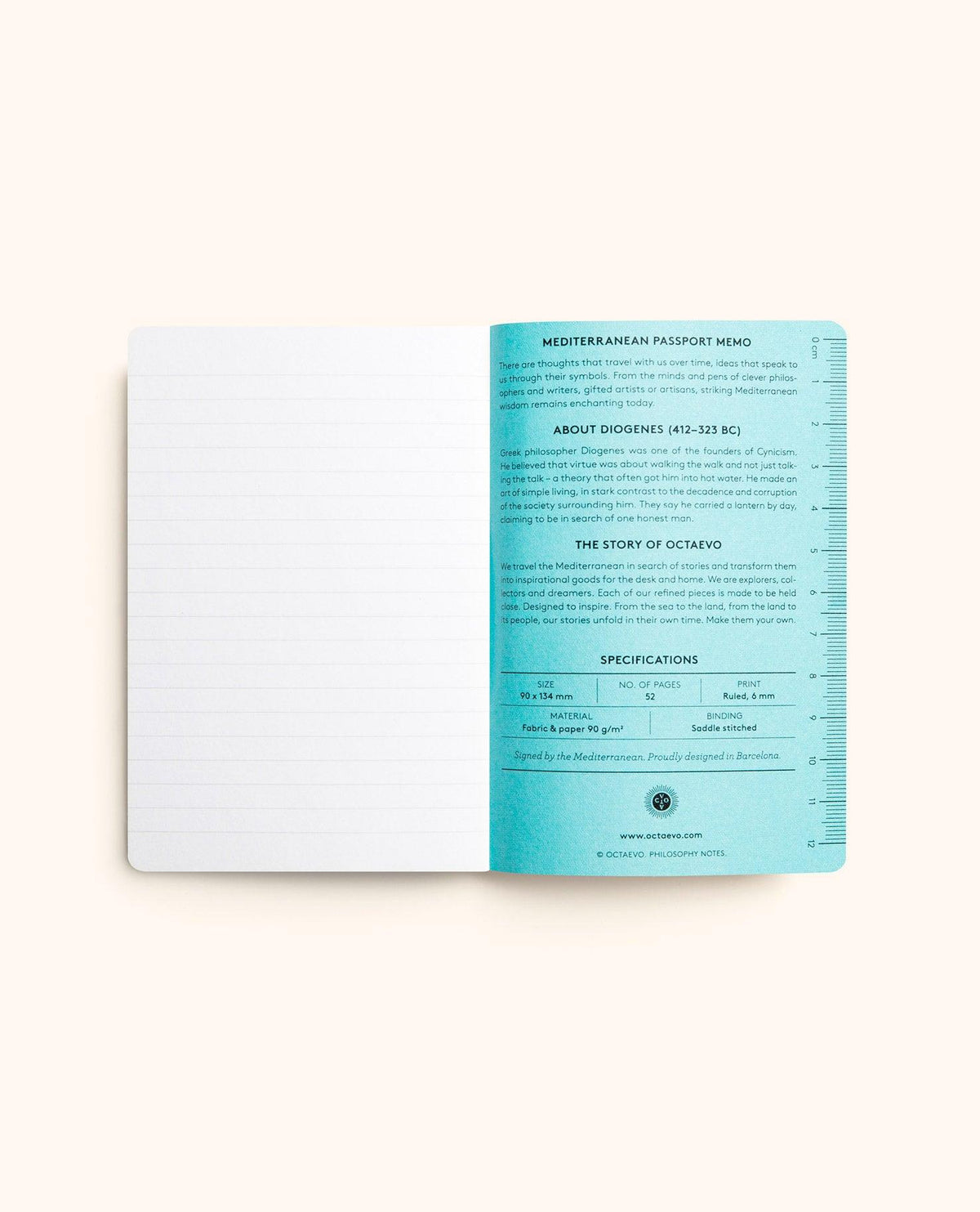 An open OCTAEVO Philosophy Passport Notes Nº 2 reveals lined pages on the left and blue printed specs on the right.